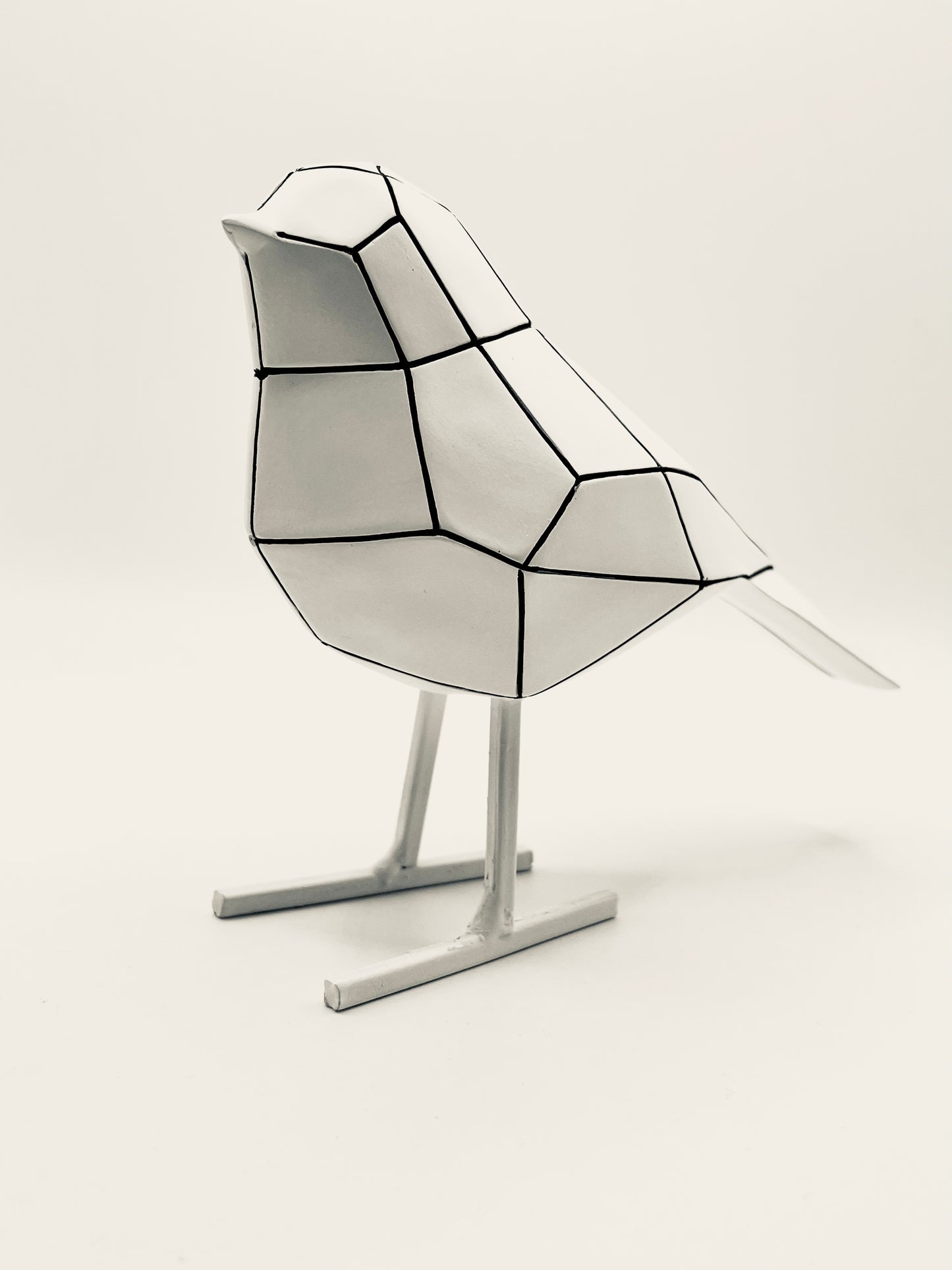 Bird statue small stripes white